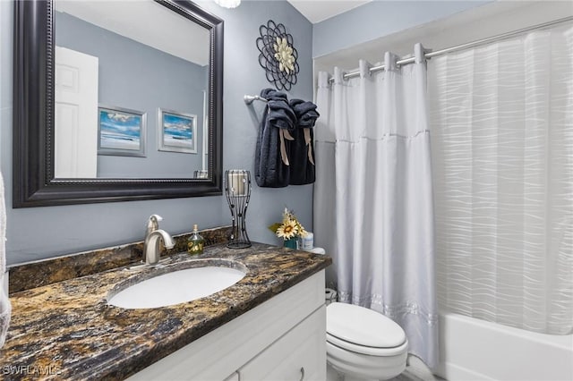 full bathroom featuring vanity, toilet, and shower / bathtub combination with curtain