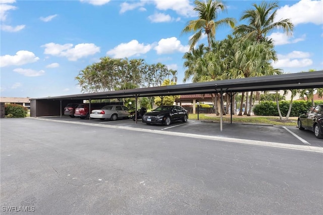 view of parking featuring a carport