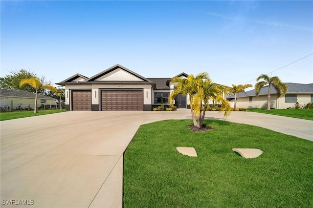 single story home featuring a front yard and a garage