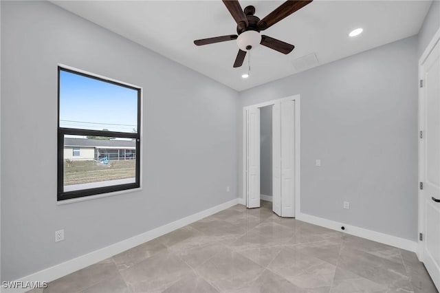 unfurnished bedroom with ceiling fan