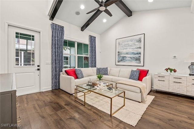 living room with vaulted ceiling with beams, ceiling fan, and dark hardwood / wood-style flooring