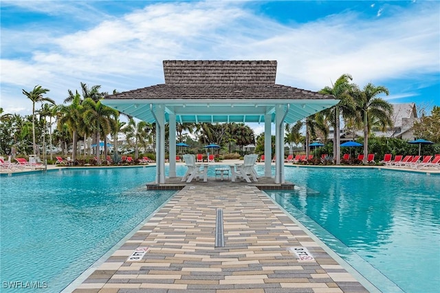 view of pool featuring a patio area and a gazebo