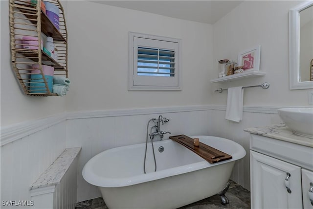 bathroom featuring vanity and a bathtub