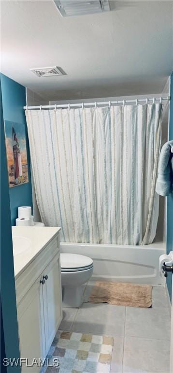 full bathroom featuring toilet, vanity, and shower / bath combination with curtain