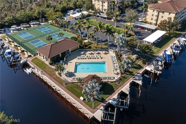 birds eye view of property with a water view