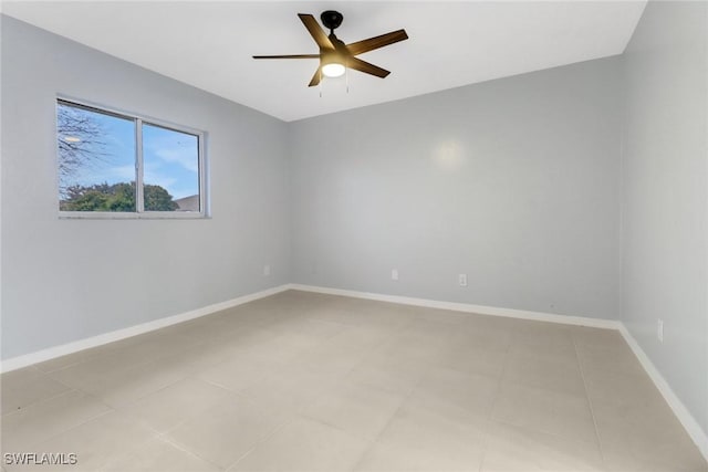 spare room with ceiling fan