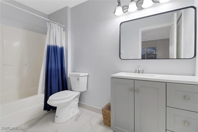 full bathroom with vanity, toilet, and shower / bath combo with shower curtain