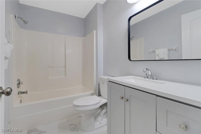 full bathroom featuring washtub / shower combination, vanity, and toilet