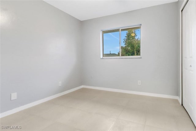 unfurnished bedroom featuring a closet