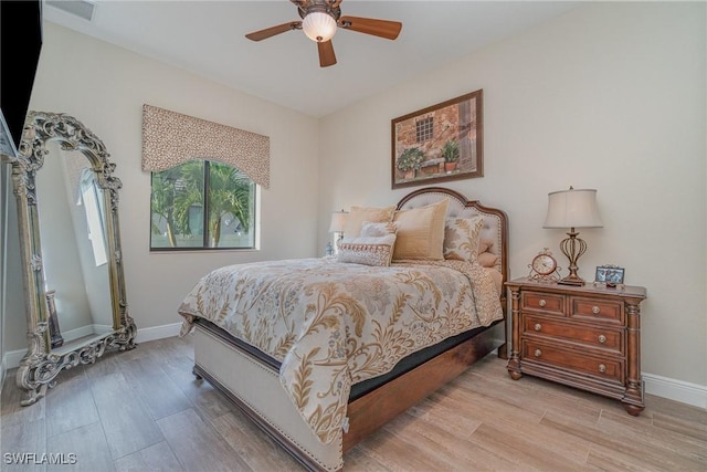 bedroom featuring ceiling fan and light wood-type flooring