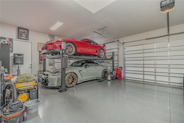 garage featuring a garage door opener