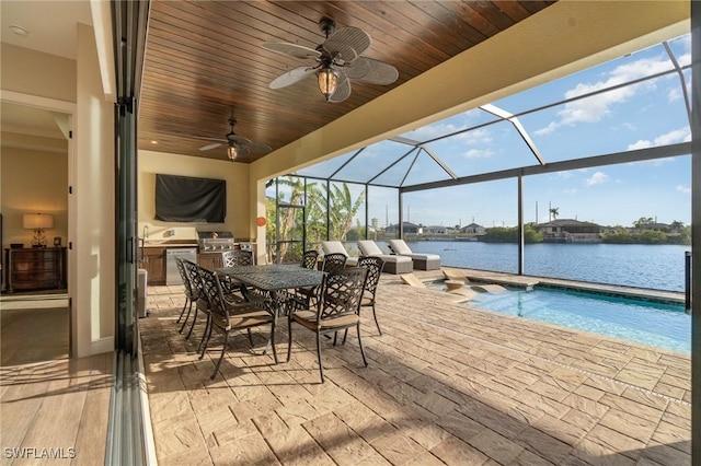 view of patio with a lanai, ceiling fan, area for grilling, outdoor dining area, and an outdoor pool