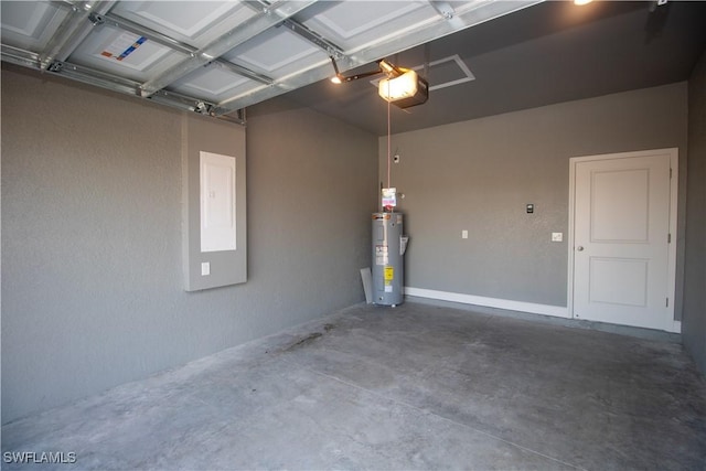 garage featuring a garage door opener and electric water heater