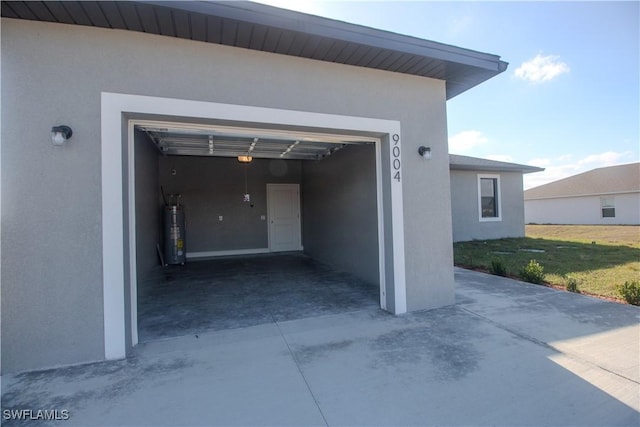 garage featuring water heater