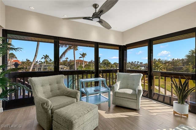 sunroom / solarium with ceiling fan