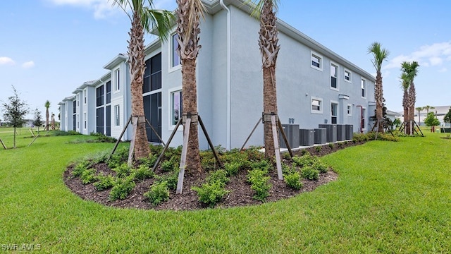 view of property featuring central AC unit