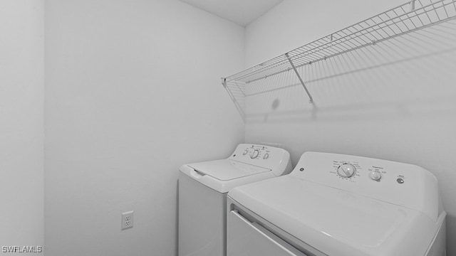 laundry room featuring independent washer and dryer