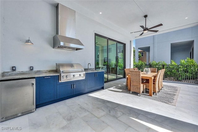 view of patio / terrace with ceiling fan, grilling area, exterior kitchen, and sink