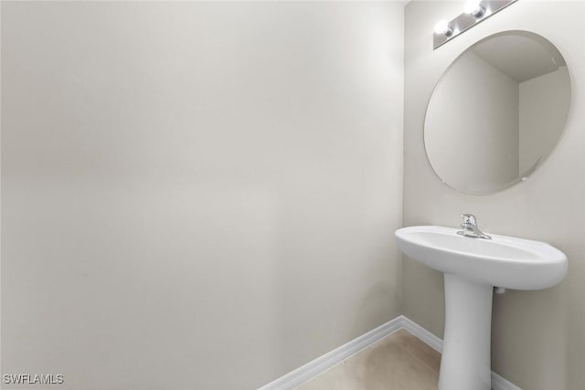 bathroom with tile patterned flooring