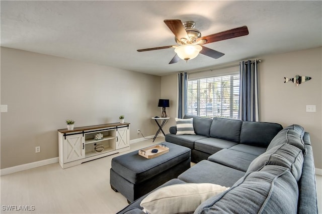 living room with ceiling fan