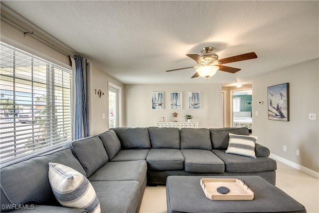 living room with ceiling fan