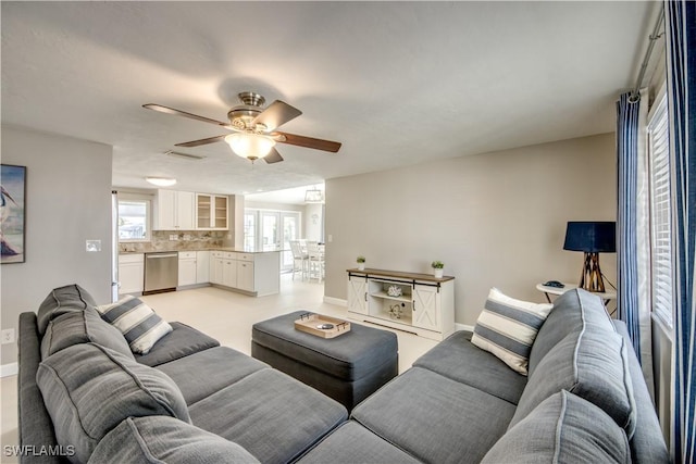 living room featuring ceiling fan