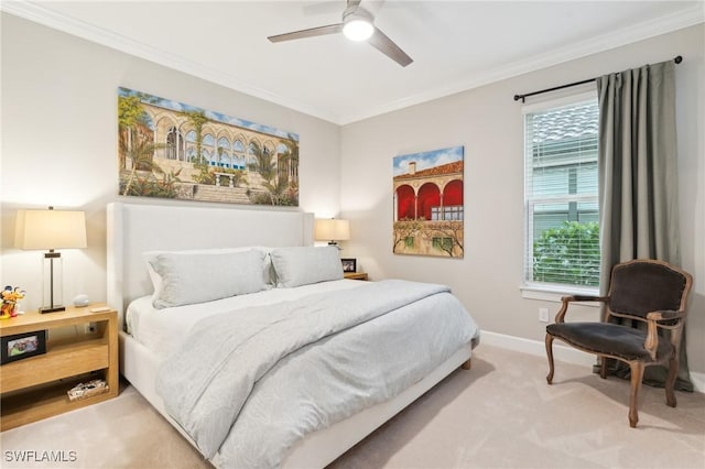 carpeted bedroom featuring ceiling fan, multiple windows, and ornamental molding