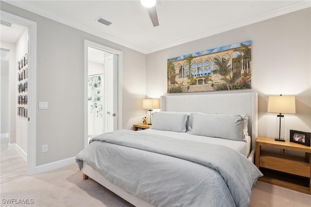 carpeted bedroom featuring ceiling fan and ornamental molding