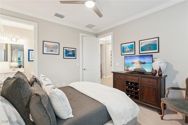 bedroom featuring ceiling fan, connected bathroom, and ornamental molding