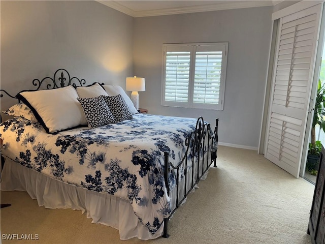 bedroom featuring carpet and ornamental molding