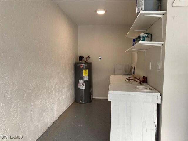 laundry area featuring electric water heater