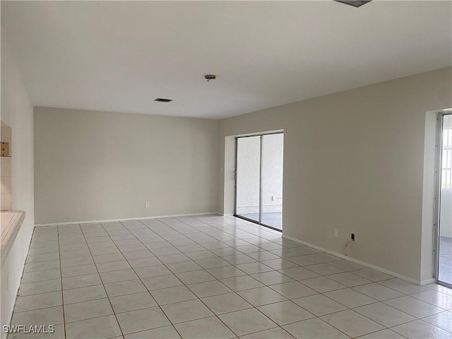 view of tiled spare room