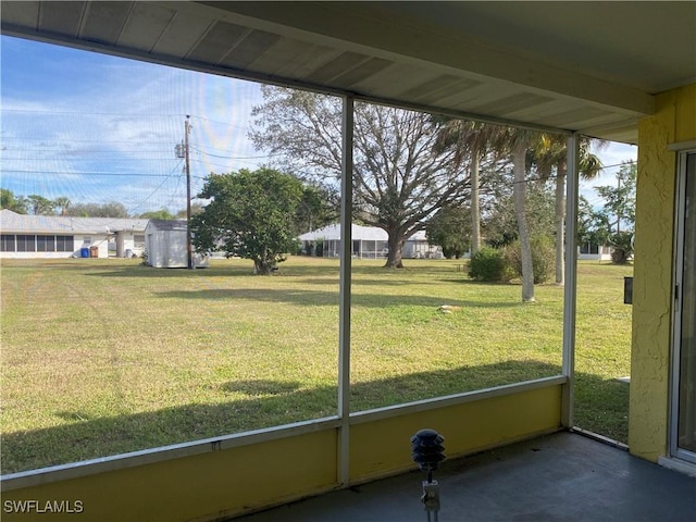 unfurnished sunroom with a wealth of natural light