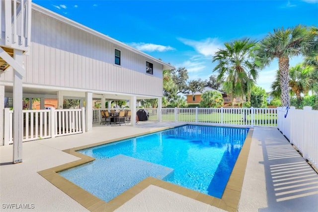 view of swimming pool featuring a patio