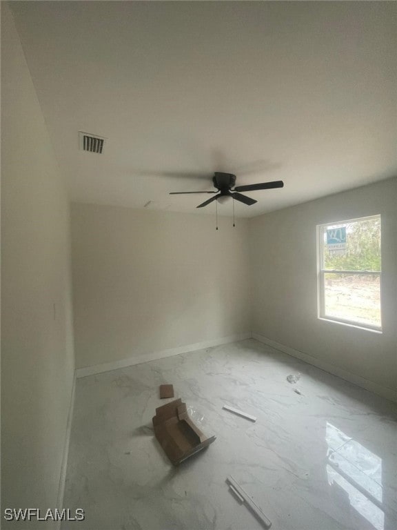 empty room featuring ceiling fan