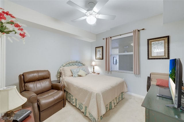 bedroom with light carpet and ceiling fan