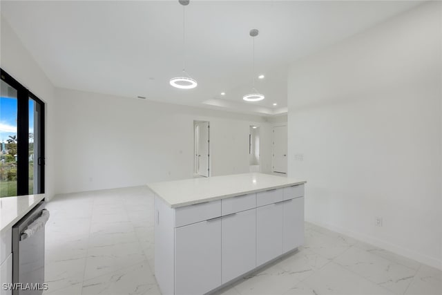 kitchen featuring a center island, marble finish floor, decorative light fixtures, recessed lighting, and white cabinetry