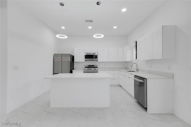 kitchen featuring appliances with stainless steel finishes, marble finish floor, visible vents, and a sink