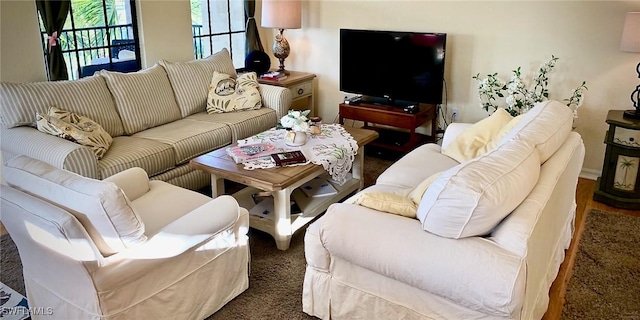 living room with dark hardwood / wood-style floors