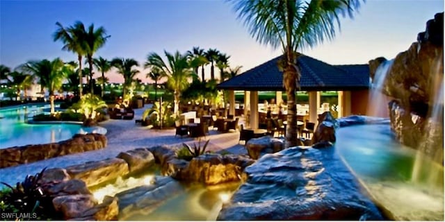 snow covered pool featuring a gazebo