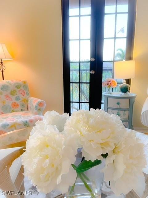 bedroom featuring french doors and multiple windows