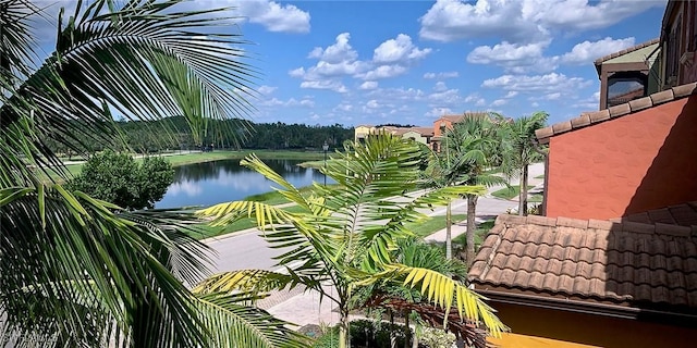 balcony featuring a water view