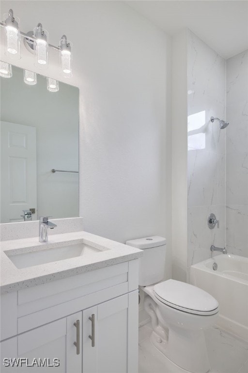 full bathroom with tiled shower / bath combo, toilet, and vanity