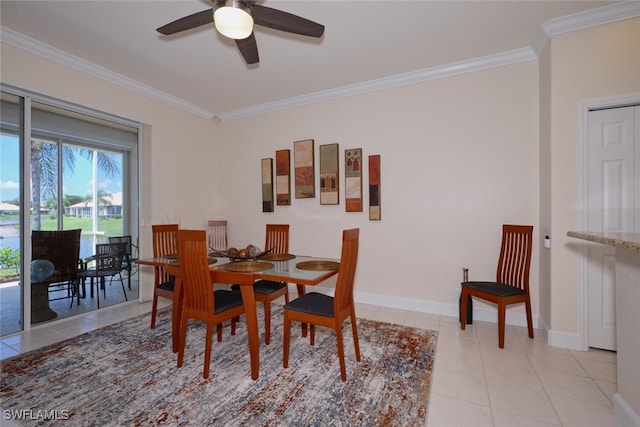 dining area with ceiling fan, crown molding, and light tile patterned flooring