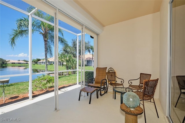 sunroom with a water view