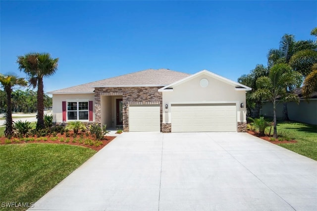 view of front of home with a garage and a front yard