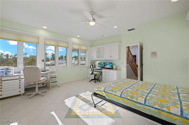 bedroom featuring ceiling fan and light tile patterned floors