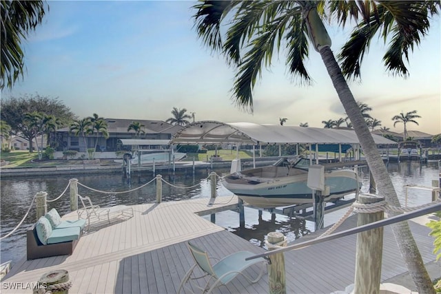 view of dock featuring a water view and boat lift