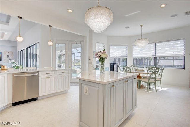 kitchen with decorative light fixtures, light tile patterned floors, recessed lighting, stainless steel dishwasher, and a chandelier