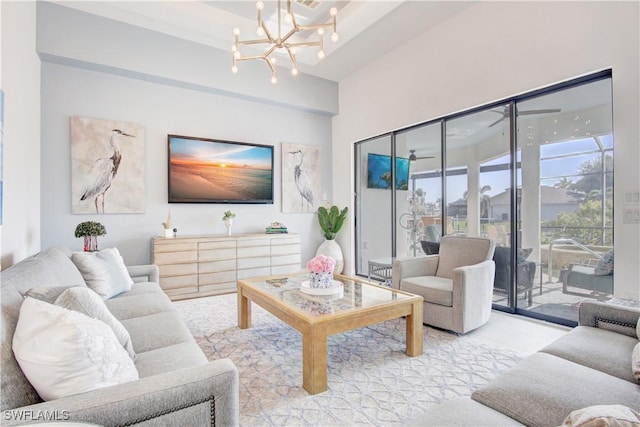 living room featuring an inviting chandelier